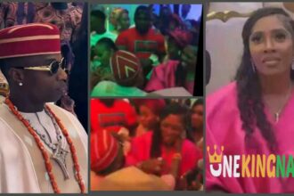Moment Tiwa Savage Playfully Nudg£d Wizkid's Hand Away Stirs Reaction At His Mum's Funeral Party (Video)