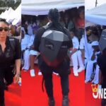 ‘’See person wey dey c@ll out Zubby michael’’- Netizens reacts as Actress Angela Okorie stuns many at Mr ibu’s funeral ceremony as he arrives in a robot-like outfit (VIDEO)